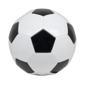 Boules de football en gros noir et blanc